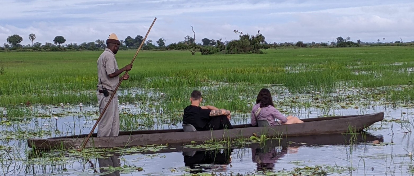 Guests exploring the Okavango Delta by mokoro with a local guide from Shangana Safaris
